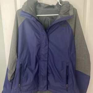 Woman’s north face rain jacket